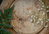 gorgeous silver chains, side by side, on a natural background. 